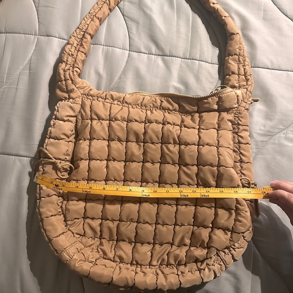 Tan Quilted Shoulder Bag with Thick Strap and Unique Zipper